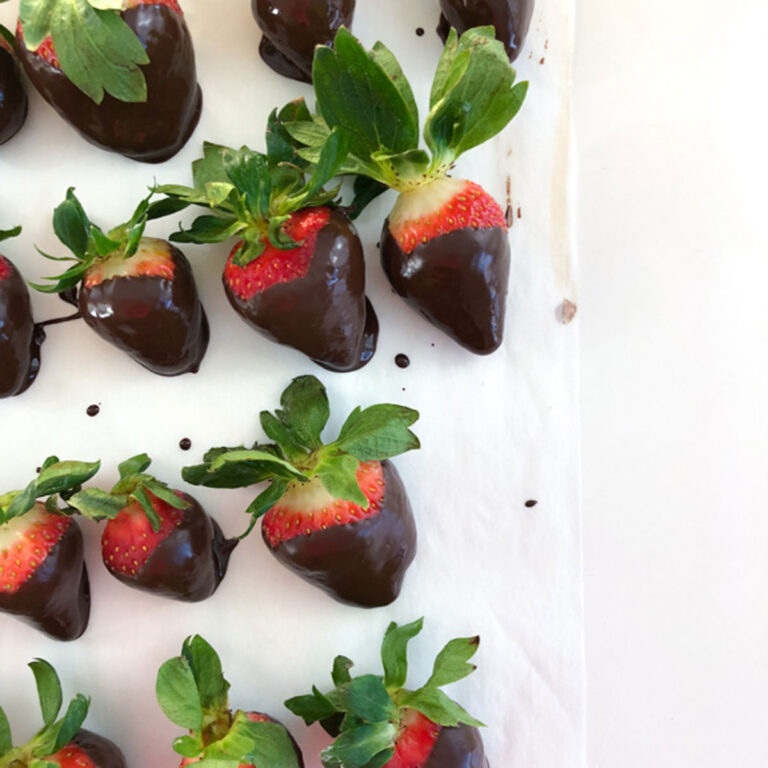 chocolate covered strawberries with white chocolate drizzle