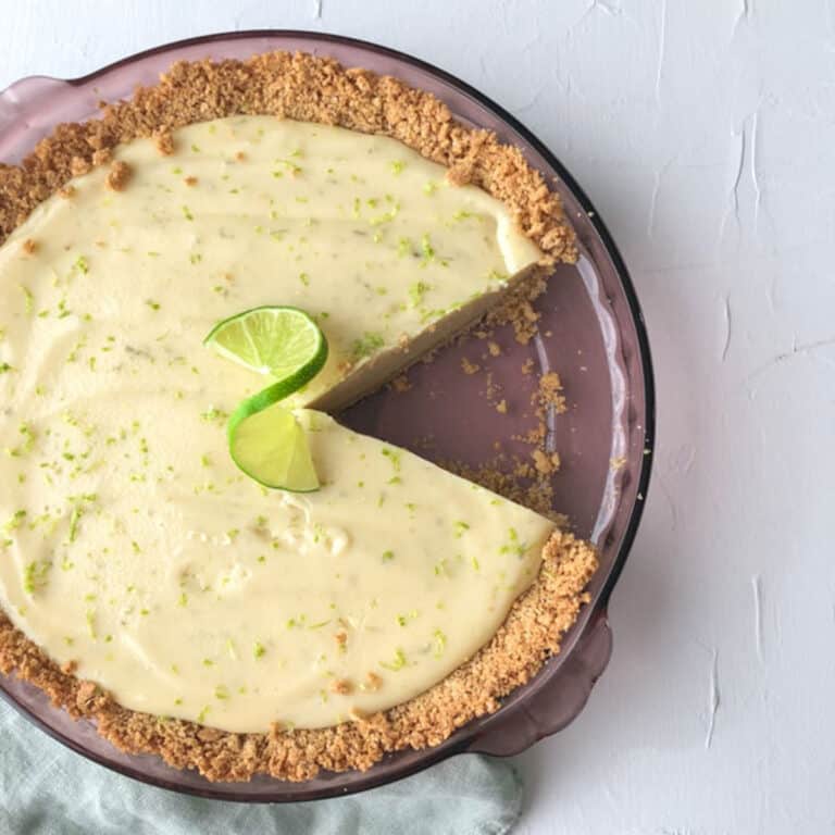 key lime pie with a slice taken out.
