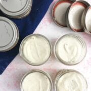 Sous Vide Vanilla Bean Cheesecake on a pin table with blue napkin