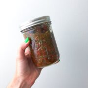 ME HOLDING A MASON JAR FULL OF Quick and Easy Garden Fresh Salsa