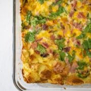 baked Kitchen Sink Breakfast Casserole in a clear baking dish