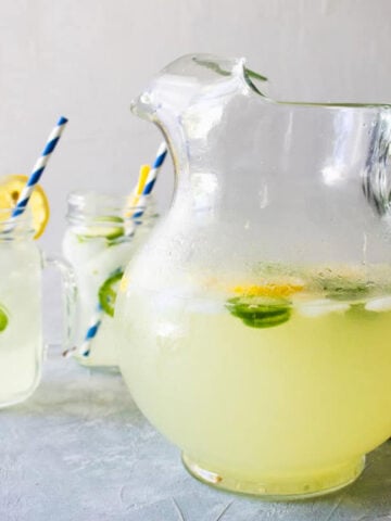 jalapeno lemonade in a pitcher and glasses