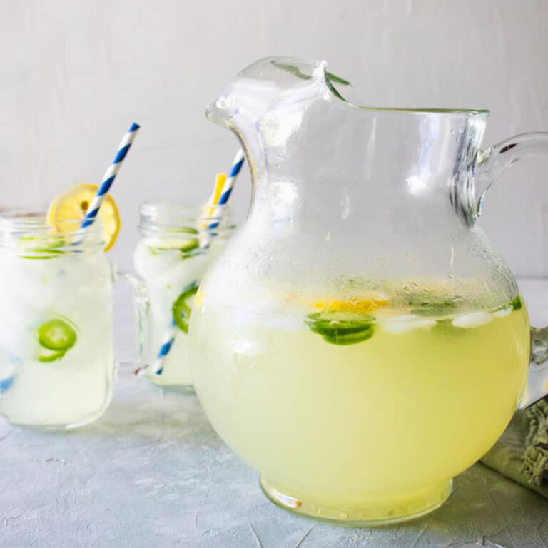 jalapeno lemonade in a pitcher and glasses