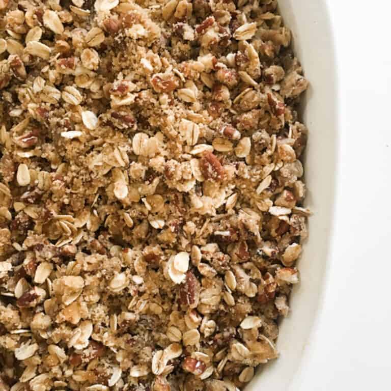 Brown Butter Sweet Potato Casserole on white table.