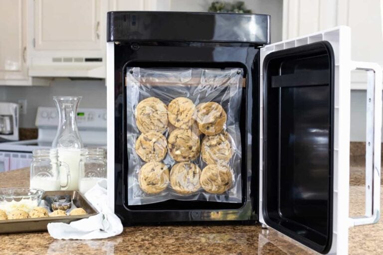 vacuum sealing cookies in a chamber vac on a counter