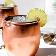 mexican mule in a copper mug with a lime slice in it