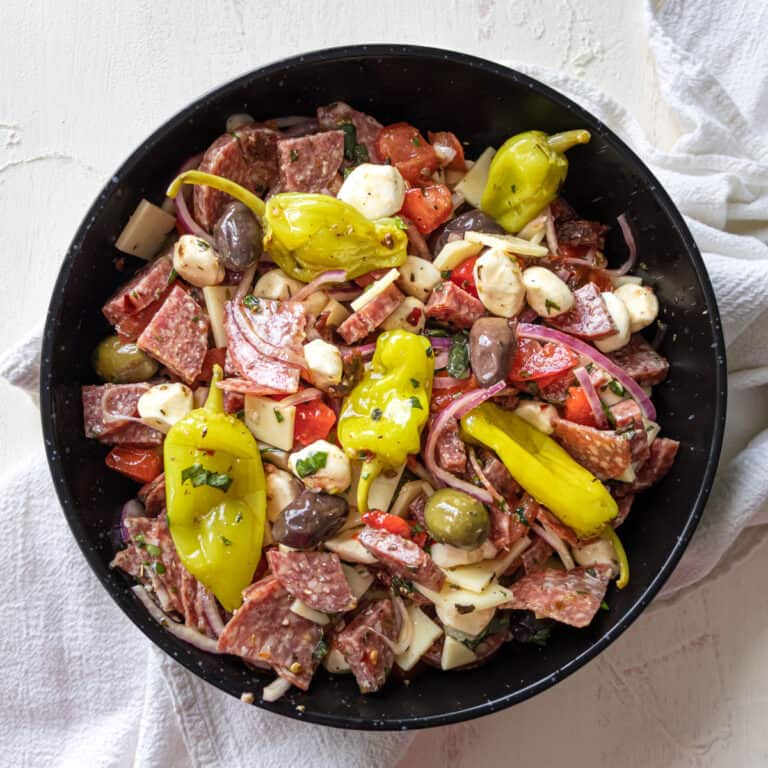 black bowl full of Zesty Italian Antipasto Salad.