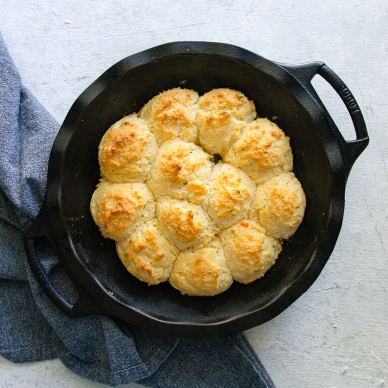 a cast iron skillet of drop biscuits.