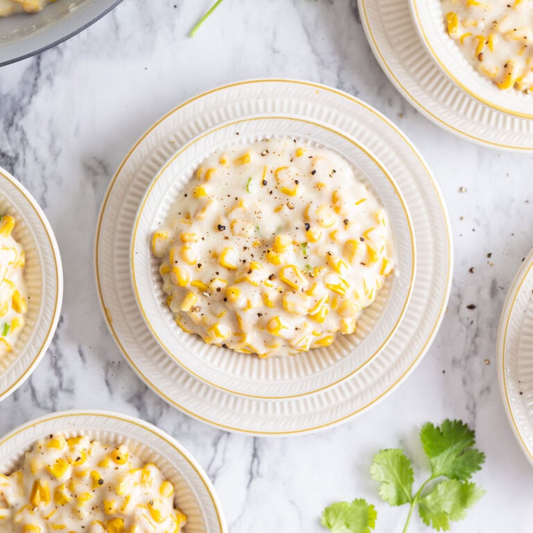 big white bowl of cream corn.