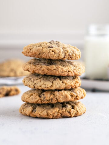 oatmeal chocolate chip pecan cookies stacked on top of each other.