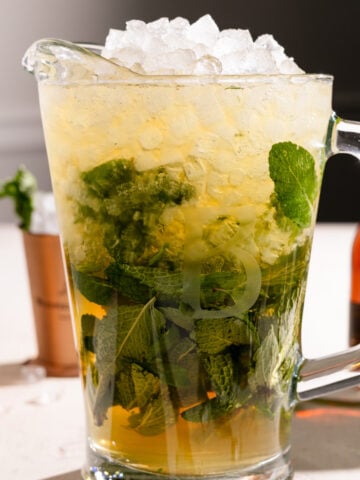 a pitcher of mint juleps