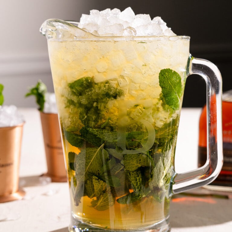 a pitcher of mint juleps