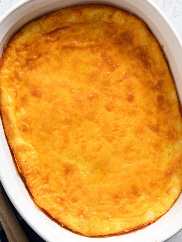 casserole dish of baked cheddar grits