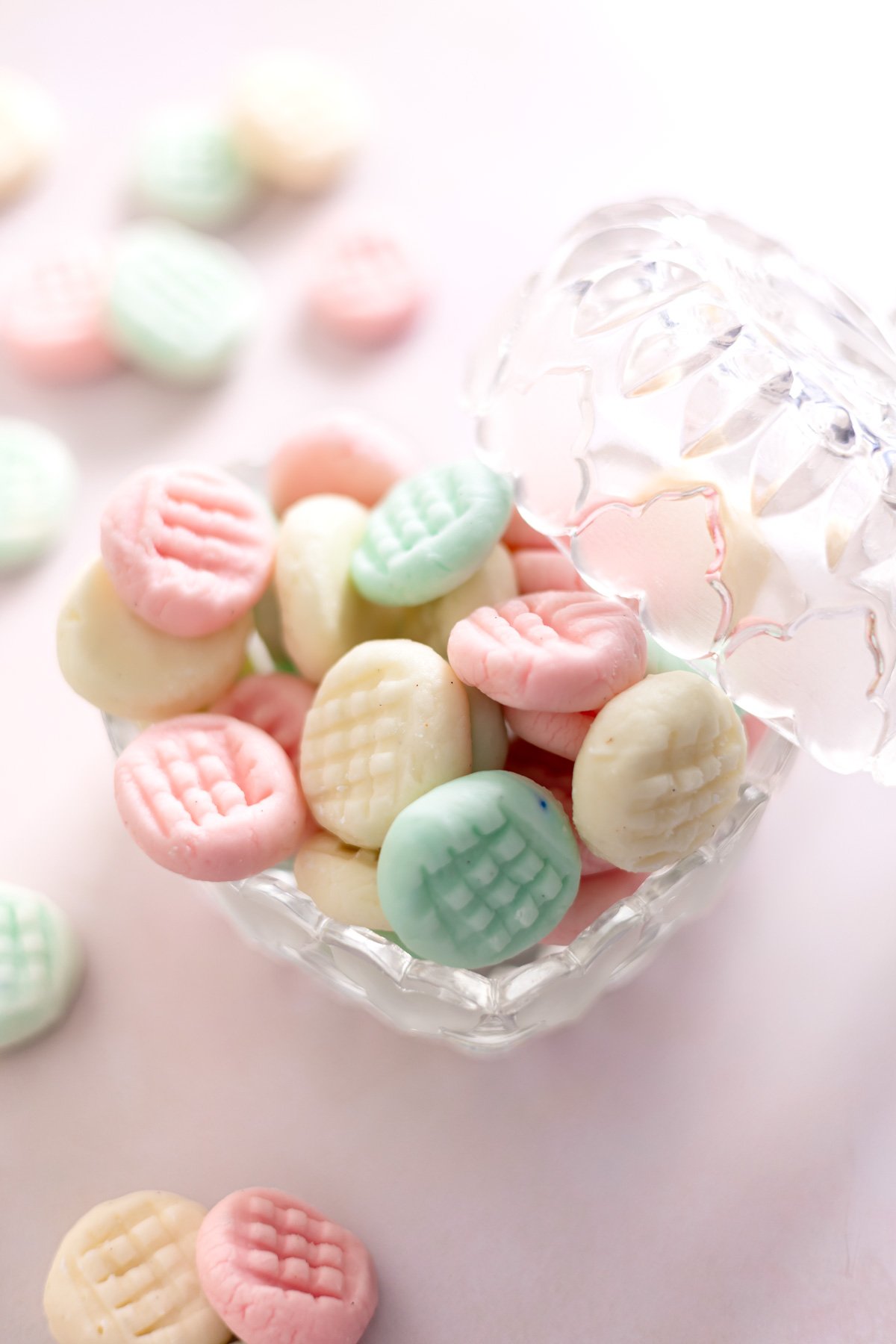Cream cheese candy mints in a candy dish.