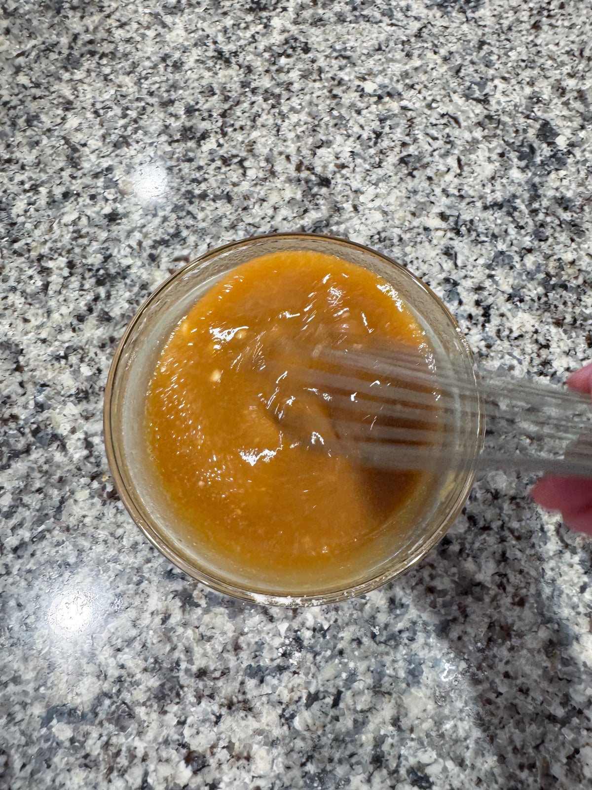 whisking together the brown sugar syrup.