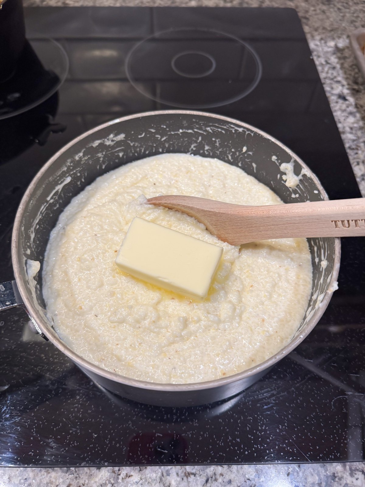 4 tablespoons of butter on a pot of grits.