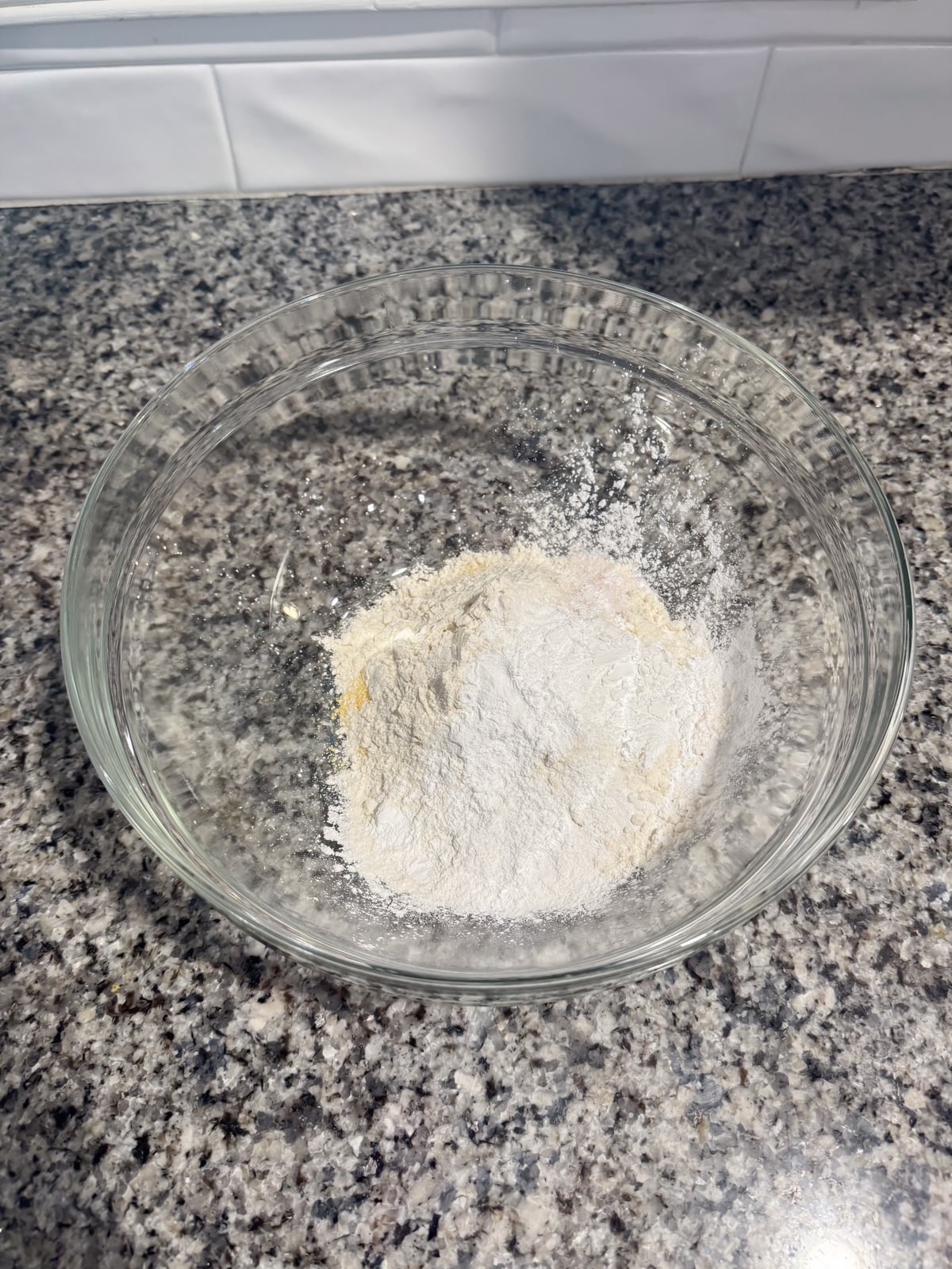 flour and cornmeal in a mixing bowl.