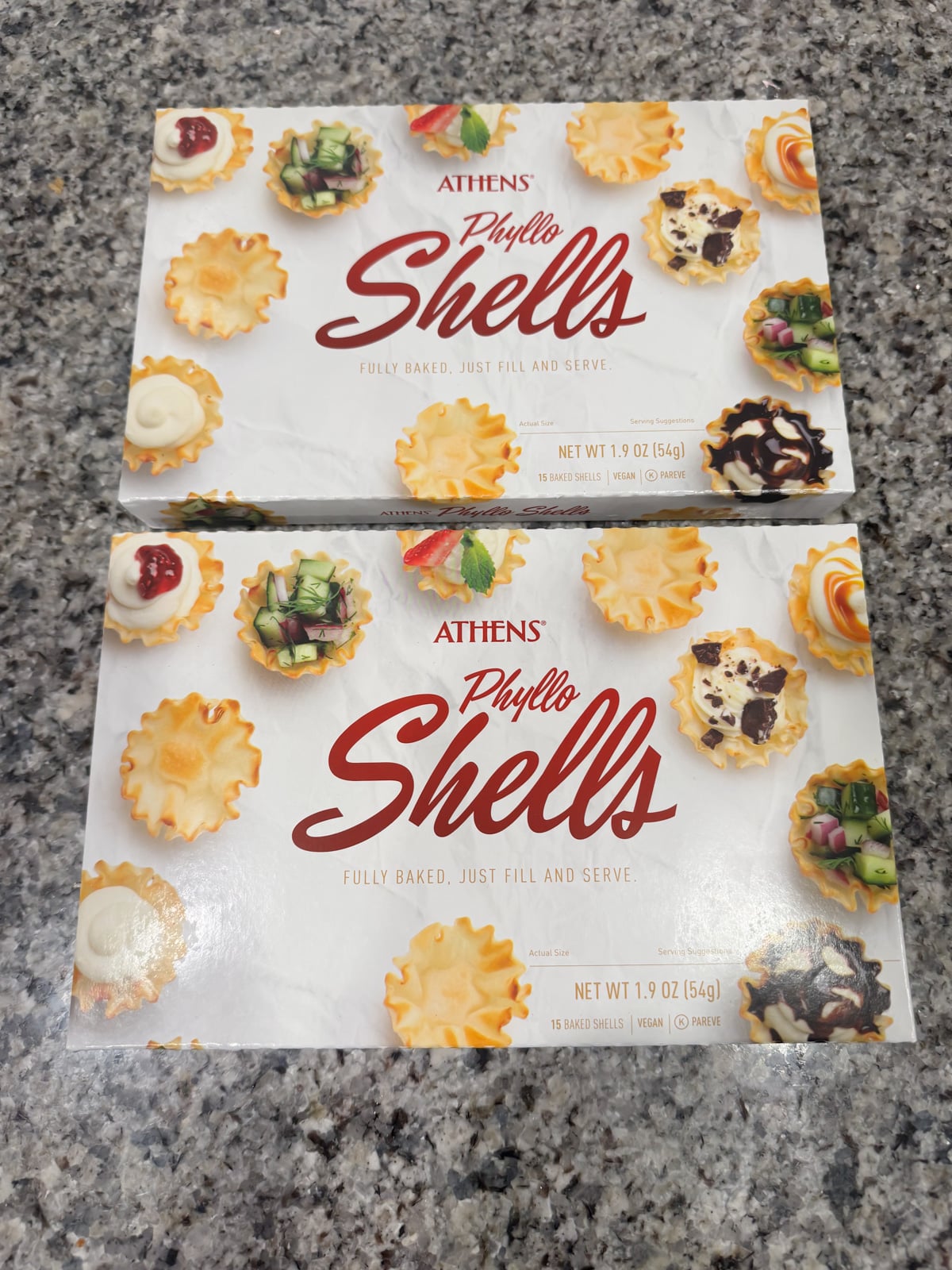 2 boxes of Athens phyllo shells on a kitchen counter.